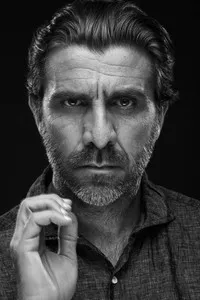 영화배우인 지오반니 칼카뇨의 대표 이미지