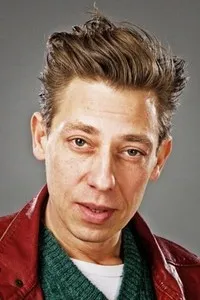 영화배우인 밀톤 웰시의 대표 이미지