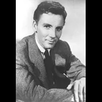 배우인 카메론 미첼의 대표 이미지