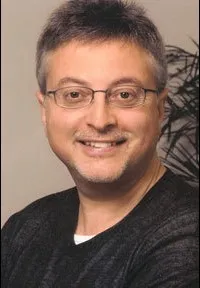 영화제작자인 마이클 E. 어슬란의 대표 이미지