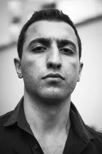 영화배우인 도구칸 폴라트의 대표 이미지