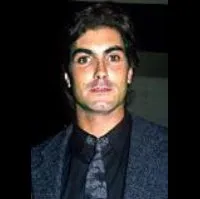 배우인 타이런 파워 주니어의 대표 이미지